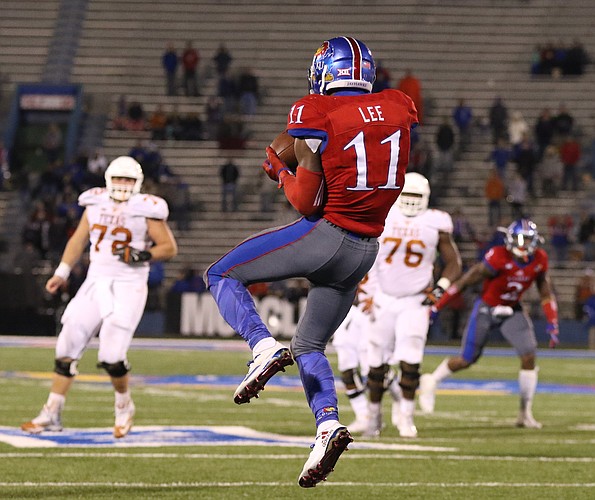 Kansas safety Mike Lee (11) intercepts a pass during overtime on Saturday, Nov. 19, 2016 at Memorial Stadium.