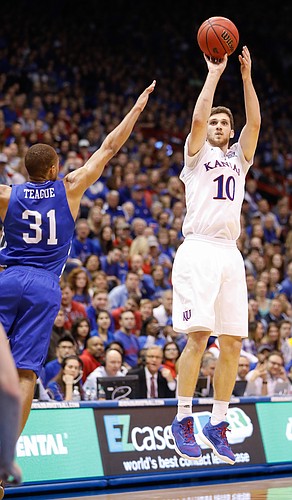 Kansas guard Sviatoslav Mykhailiuk (10) shoots in one of his two three-point baskets in the Jayhawks 95-57 win against UNC Asheville Friday night, Nov. 25, in Allen Fieldhouse. 