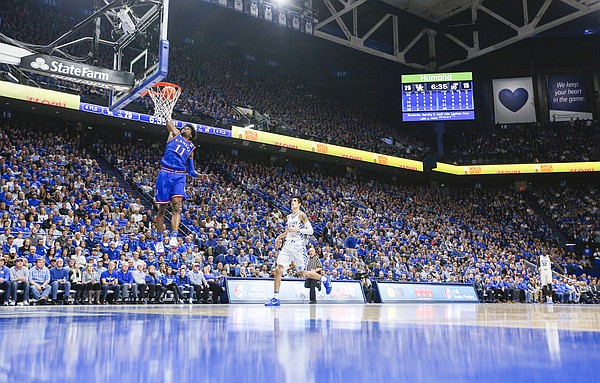 Kansas guard Josh Jackson (11) comes in for a breakaway dunk during the first half, Saturday, Jan. 28, 2017 at Rupp Arena in Lexington, Kentucky.