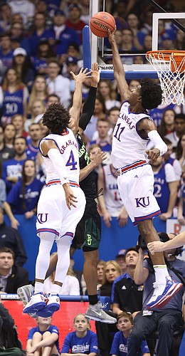Kansas guard Josh Jackson (11) rejects a shot from Baylor guard Al Freeman (25) during the first half, Wednesday, Feb. 1, 2017 at Allen Fieldhouse.