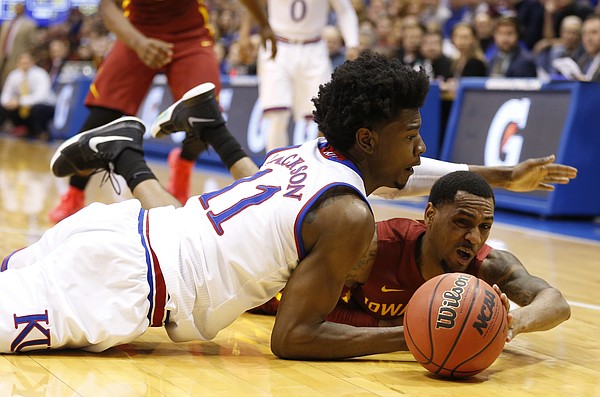Kansas guard Josh Jackson (11) loses a ball to Iowa State guard Monte Morris during the second half, Saturday, Feb. 4, 2017 at Allen Fieldhouse.