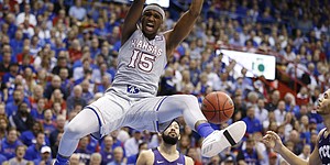 Kansas forward Carlton Bragg Jr. (15) delivers on a put back dunk during the first half, Wednesday, Feb. 22, 2017 at Allen Fieldhouse.