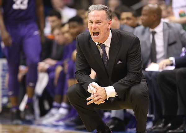 TCU head coach Jamie Dixon yells at his defense during the second half, Wednesday, Feb. 22, 2017 at Allen Fieldhouse.