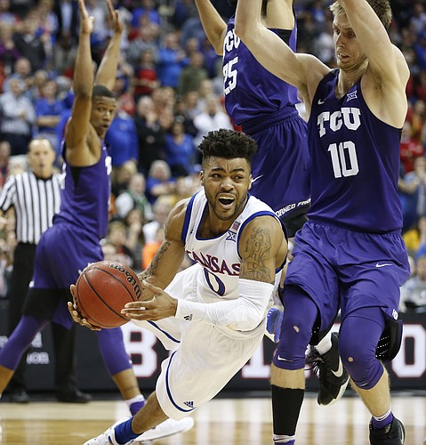 Kansas guard Frank Mason III (0) is fouled with seconds to go during the second half, Thursday, March 9, 2017 at Sprint Center. At right is TCU forward Vladimir Brodziansky (10).