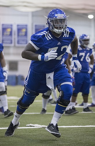 A transfer from Alabama, offensive lineman Charles Baldwin sat out the 2016 season at Kansas. This spring, the 6-foot-5, 305-pound junior right tackle finally gets to practice with the first-stringers on offense, as the Jayhawks begin preparation for the 2017 season.