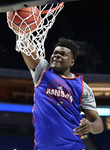 Injured Kansas center Udoka Azubuike (35) delivers a dunk at the end of the Jayhawks' practice on Thursday, March 16, 2017 at BOK Center in Tulsa, Oklahoma.