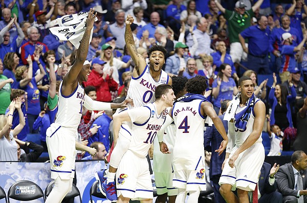 The Kansas bench goes wild after a late three by reserve guard Tyler Self with seconds remaining in the Jayhawks' 100-62 win over UC Davis on Friday, March 17, 2017 at BOK Center in Tulsa, Oklahoma.