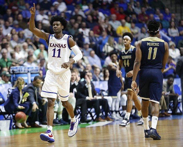 Kansas guard Josh Jackson (11) signals the ball going the Jayhawks' way after a UC Davis turnover during the second half on Friday, March 17, 2017 at BOK Center in Tulsa, Oklahoma.