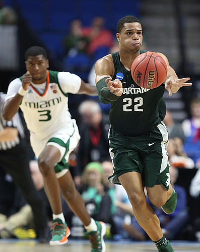 Michigan State guard Miles Bridges (22) pushes the ball up the court during the second half on Friday, March 17, 2017 at BOK Center in Tulsa, Oklahoma.