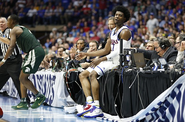 Kansas guard Josh Jackson (11) protests a foul called against him after he thought he was pushed into the scorers table during the second half on Sunday, March 19, 2017 at BOK Center in Tulsa, Okla.