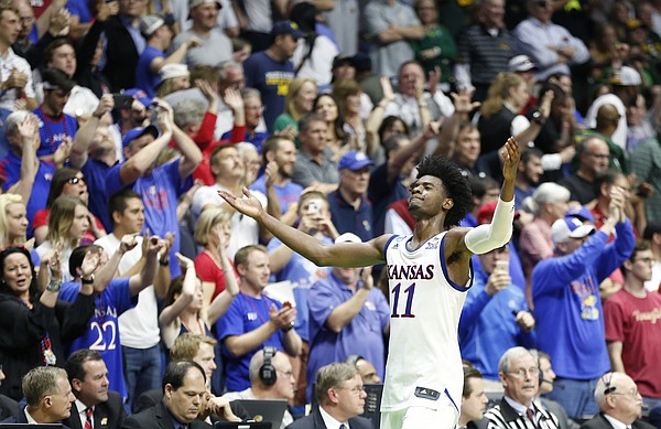 Kansas guard Josh Jackson (11) raises up his arms as he leaves the court with little time remaining during the Jayhawks' 90-70 win over Michigan State on Sunday, March 19, 2017 at BOK Center in Tulsa, Okla.