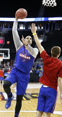 Kansas forward Landen Lucas (33) turns for a shot during a day of practices and press conferences prior to Thursday's game at Sprint Center in Kansas City, Mo.
