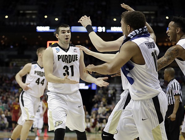 Purdue's Dakota Mathias (31) celebrates with his teammates during the first half of an NCAA college basketball tournament second-round game against Iowa State Saturday, March 18, 2017, in Milwaukee. 