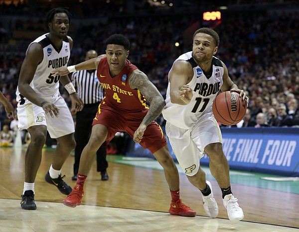 Purdue's P.J. Thompson (11) drives against Iowa State's Donovan Jackson (4) during the second half of an NCAA college basketball tournament second-round game Saturday, March 18, 2017, in Milwaukee.