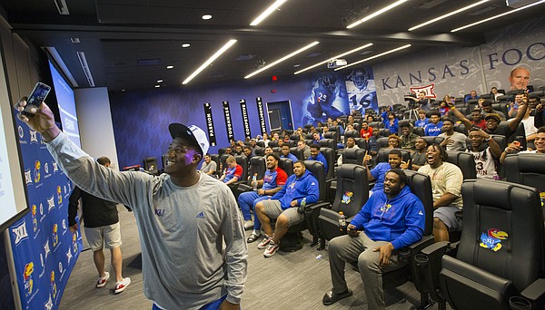 Kansas defensive tackle Daniel Wise shoots a selfie of himself and his team after being selected as the fourth-overall pick during a spring game player draft on Wednesday, April 12, 2017 at the Anderson Family Football Complex.