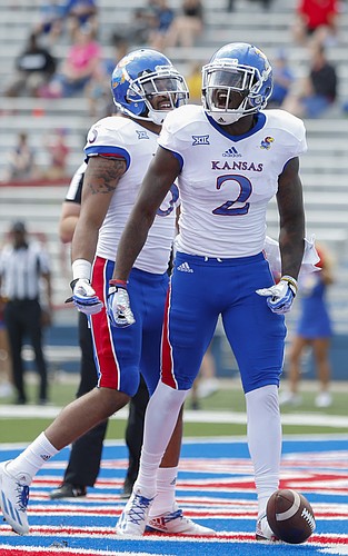 Team Jayhawks receiver Daylon Charlot roars after scoring what proved to be the winning touchdown during the fourth quarter of the 2017 Spring Game on Saturday, April 15 at Memorial Stadium.