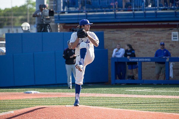 Kansas pitcher Jackson Goddard winds up for a pitch in the second inning against Kansas State in the Sunflower Showdown on Friday, May 12, 2017 at Hoglund Ballpark.

