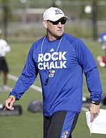 Kansas football head coach David Beaty watches a drill during the team's second practice of fall camp on Tuesday, Aug. 1, 2017. 