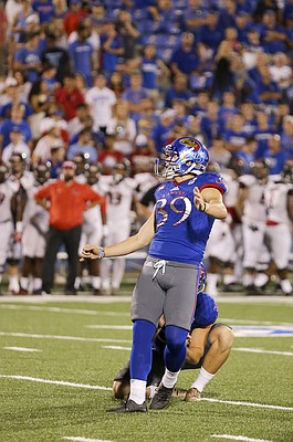 Kansas place kicker Gabriel Rui (39) watches his kick on a field goal attempt during the fourth quarter on Saturday, Sept. 2, 2017 at Memorial Stadium.