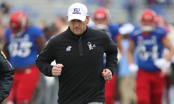 Kansas head coach David Beaty runs off the field following the Jayhawks' 38-9 loss to Baylor on Saturday, Sept. 4, 2017 at Memorial Stadium. Before Saturday's game, Baylor was winless on the season.