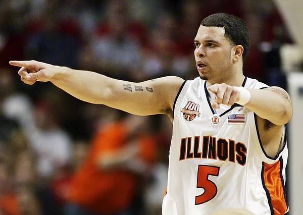 Illinois' Deron Williams directs his teammates in the second half against Wisconsin during the championship game of the Big Ten tournament Sunday, March 13, 2005, at the United Center in Chicago. (AP Photo/Michael Conroy)

