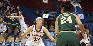 Kansas junior Kylee Kopatich defends Baylor guard Natalie Chou on the perimeter while KU freshman Bailey Helgren fronts BU center Kalani Brown in the paint during the first half of the Jayhawks' 83-48 loss to the Bears on Saturday at Allen Fieldhouse.