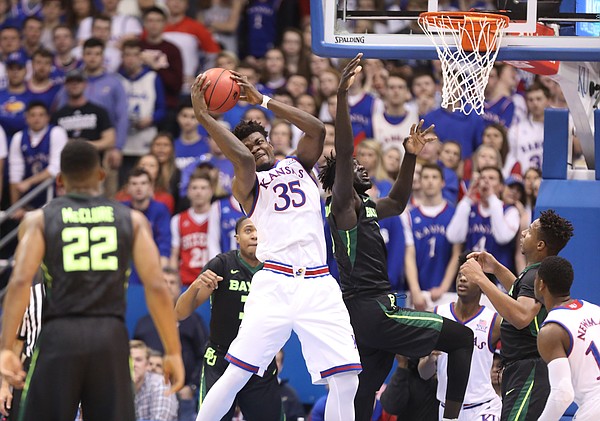 Kansas center Udoka Azubuike (35) rips a rebound away from Baylor center Jo Lual-Acuil Jr. during the first half, Saturday, Jan. 20, 2018 at Allen Fieldhouse.