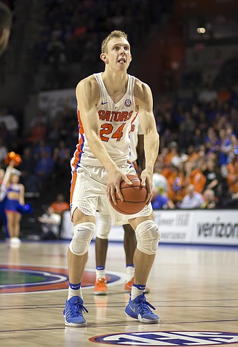 Florida guard Canyon Barry (24) goes old school with his underhand free throws during the second half of an NCAA college basketball game against Missouri in Gainesville, Fla., Thursday, Feb. 2, 2017. Florida won 93-54. (AP Photo/Ron Irby)
