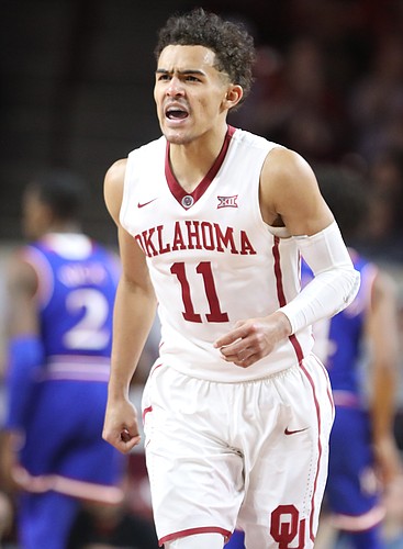 Oklahoma guard Trae Young (11) celebrates a bucket during the second half at Lloyd Noble Center on Tuesday, Jan. 23, 2018 in Norman, Oklahoma.