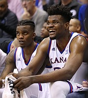 Kansas center Udoka Azubuike, right, has a laugh with Kansas guard Lagerald Vick during the second half, Saturday, Jan. 27, 2018 at Allen Fieldhouse.