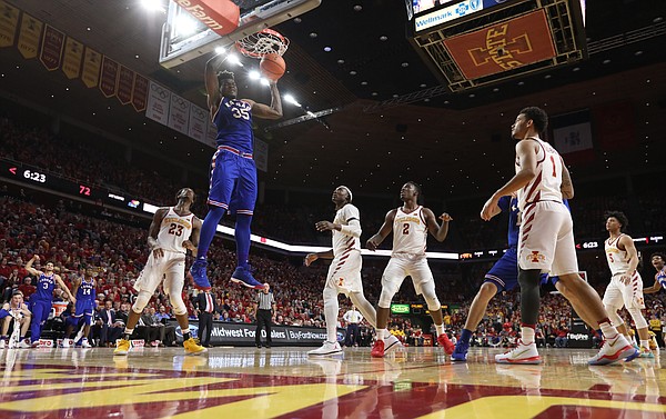 Kansas center Udoka Azubuike (35) comes in to finish a lob jam during the second half, Tuesday, Feb. 13, 2018 at Hilton Coliseum in Ames, Iowa.