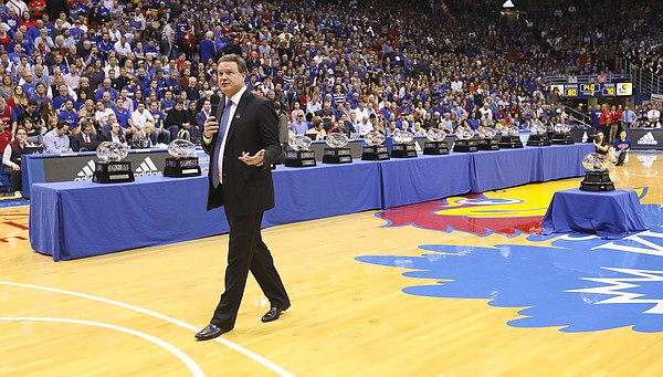 Kansas head coach Bill Self lauds his players before 14 Big 12 conference championship trophies during the celebration following their 80-70 win over Texas on Monday, Feb. 26, 2018 at Allen Fieldhouse. The win gave the Jayhawks an outright win of their 14th-straight Big 12 Conference title.
