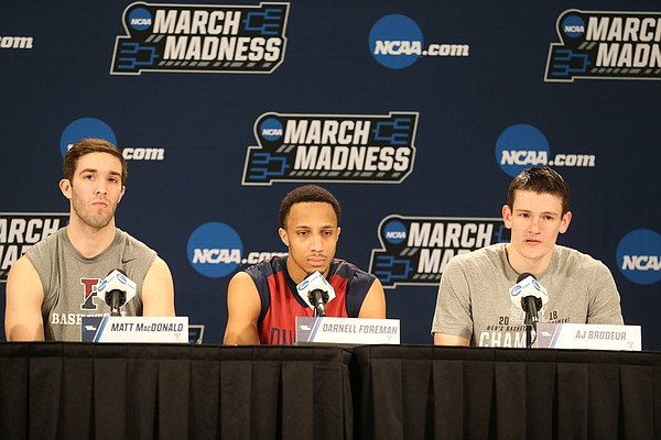 Penn players Matt MacDonald, Darnell Foreman and A.J. Border take questions from media members during a day of practices and press conferences at Intrust Bank Arena in Wichita, Kan.