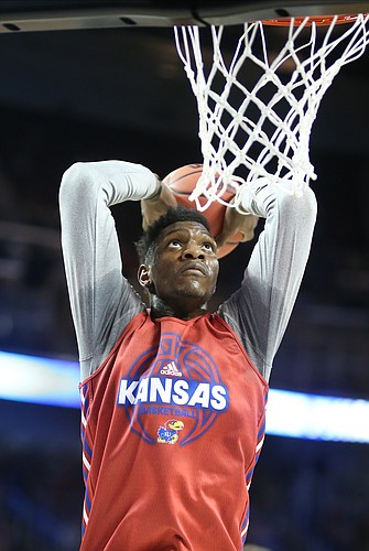 Kansas forward Silvio De Sousa comes in for a dunk during practice on Wednesday, March 14, 2018 at Intrust Bank Arena in Wichita, Kan.