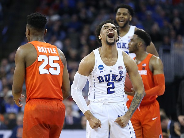 Duke guard Gary Trent Jr. (2) celebrates a Syracuse turnover before Syracuse guard Tyus Battle (25) during the second half, Friday, March 23, 2018 at CenturyLink Center in Omaha, Neb.