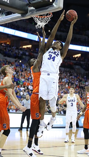 Duke forward Wendell Carter Jr (34) gets up for a bucket during the second half, Friday, March 23, 2018 at CenturyLink Center in Omaha, Neb.