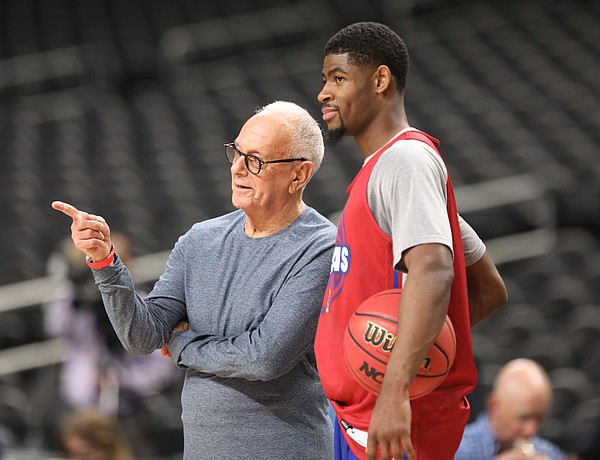 Kansas guard Malik Newman (14) and former Kansas head coach Larry Brown talk on the sidelines on Friday, March 30, 2018 at the Alamodome in San Antonio, Texas.