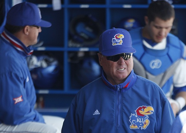 Kansas baseball coach Ritch Price watches the Jayhawks from the dugout during a home game against No. 5 Texas Tech, Saturday, April 8, 2018, at Hoglund Ballpark. 