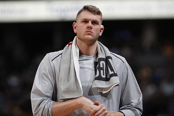 Minnesota Timberwolves center Cole Aldrich (45) in the second half of an NBA basketball game Thursday, April 5, 2018, in Denver. The Nuggets won 100-96. (AP Photo/David Zalubowski)