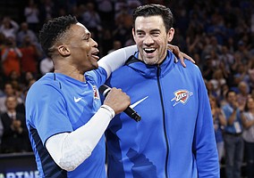 Oklahoma City Thunder guard Russell Westbrook, left, addresses the crowd with teammate Nick Collison, right, before an NBA basketball game against the Memphis Grizzlies in Oklahoma City, Wednesday, April 11, 2018. (AP Photo/Sue Ogrocki)