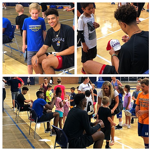 KU freshman Quentin Grimes, along with teammates Ochai Agbaji, Silvio De Sousa and K.J. Lawson (not pictured), spent part of their day Tuesday working Washburn Basketball camp and visiting with young fans in Topeka. 