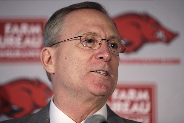FILE - In this Sept. 15, 2014, file photo, former University of Arkansas athletic director Jeff Long speaks during a news conference in Little Rock, Ark. Long was named the new athletic director at the University of Kansas, on July 5, 2018.  (AP Photo/Danny Johnston, File)

