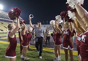 Troy head coach Neal Brown celebrates his team's 24-21 victory over LSU in an NCAA college football game in Baton Rouge, La., Saturday, Sept. 30, 2017. (AP Photo/Matthew Hinton)