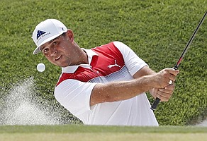 Gary Woodland hits out of a bunker on the sixth green during the final round of the PGA Championship golf tournament at Bellerive Country Club, Sunday, Aug. 12, 2018, in St. Louis. (AP Photo/Jeff Roberson)