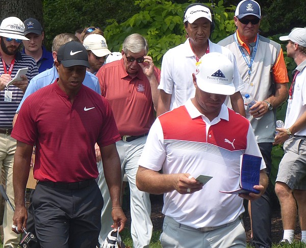 Gary Woodland and Tiger Woods head toward fourth tee box at Bellerive in the 100th PGA Championship as Missouri Gov. tugs at his sunglasses. (Photo by Tom Keegan)