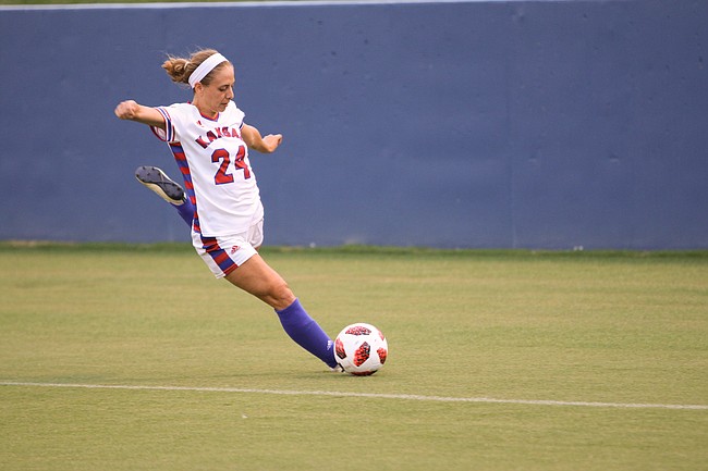 Defender Elise Reina sends a ball in play Sunday at Rock Chalk Park. Reina scored the lone goal in Kansas' win over No. 25 Butler.