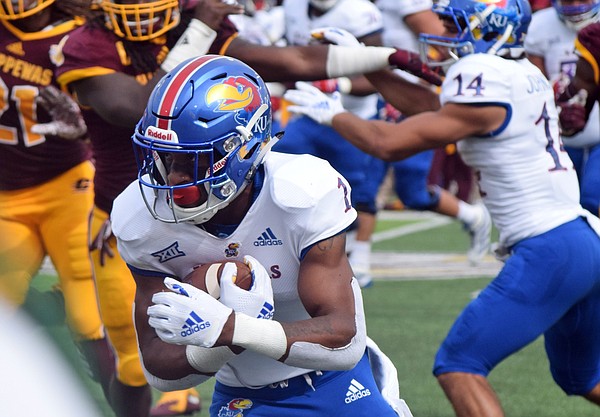 Kansas running back Pooka Williams Jr. carries the ball against Central Michigan during a game Saturday, Sept. 8, 2018, in Mount Pleasant, Mich. (Jim Lahde/The Morning Sun via AP)