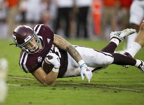Texas A&M tight end Jace Sternberger (81) lunges forward at the end of a catch against Clemson during the first half of an NCAA college football game Saturday, Sept. 8, 2018, in College Station, Texas. (AP Photo/Sam Craft)
