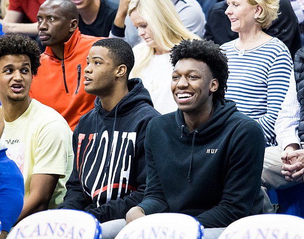 Kansas basketball recruits, from left to right, Jeremiah Robinson-Earl, Cassius Stanley and James Wiseman, take in the scene at Late Night in the Phog on Friday, Sept. 28, 2018. 