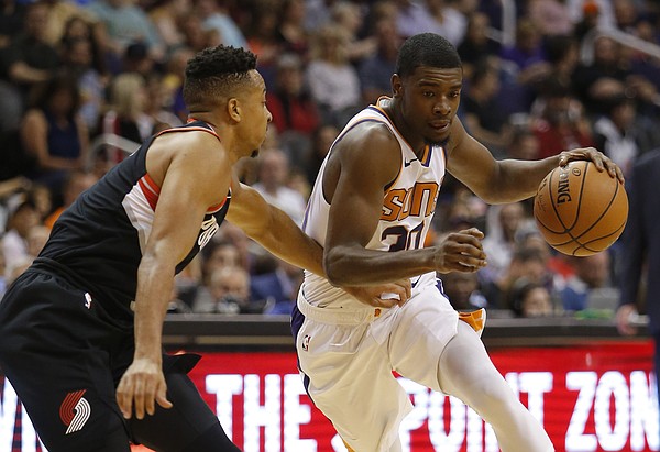 Phoenix Suns forward Josh Jackson (20) in the first half during an NBA preseason basketball game against the Portland Trail Blazers, Friday, Oct. 5, 2018, in Phoenix. (AP Photo/Rick Scuteri)